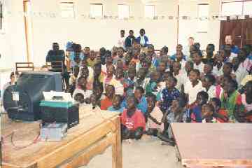 Kids at Deaf School watching a video