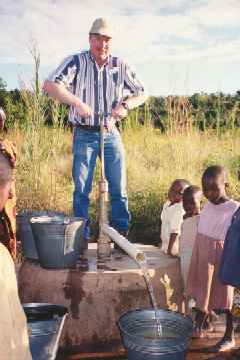Duane Roosa pumping water
