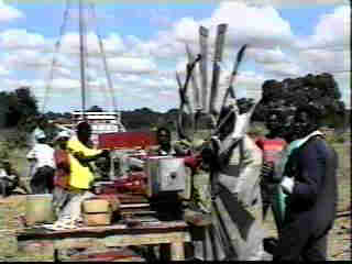 Assembling the windmill on the ground.